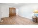 Spacious living room with modern wood-look flooring and ample natural light at 145 Mark St, Franklinton, NC 27525