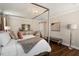 Bright bedroom boasts a serene ambiance with a comfortable bed and stylish decor at 1601 Glazebrook Dr, Wake Forest, NC 27587