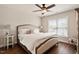 Cozy bedroom features a plush bed, side table, and natural light at 1601 Glazebrook Dr, Wake Forest, NC 27587