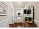 Inviting entryway with hardwood floors and stylish decor at 1601 Glazebrook Dr, Wake Forest, NC 27587