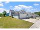 Well-kept home exterior with an attached two-car garage and a neatly manicured lawn at 1601 Glazebrook Dr, Wake Forest, NC 27587