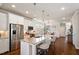Modern kitchen featuring stainless steel appliances, granite countertops and lots of light at 1601 Glazebrook Dr, Wake Forest, NC 27587
