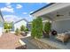 Inviting covered patio with comfortable seating and a ceiling fan, perfect for outdoor relaxation at 1601 Glazebrook Dr, Wake Forest, NC 27587