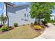 Well-manicured lawn and landscaping with a view of the side of the house at 1601 Glazebrook Dr, Wake Forest, NC 27587