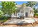 Backyard features a deck with grill, as well as the home's back entrance at 1712 Briarforest Pl, Raleigh, NC 27615