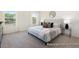 Relaxing bedroom with soft lighting, neutral tones, and elegant furnishings at 187 Curling Creek Dr # 298P, Clayton, NC 27527