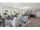 Spacious living area with hardwood floors, a modern kitchen, and comfortable seating at 187 Curling Creek Dr # 298P, Clayton, NC 27527