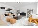 Bright living room with contemporary furnishings and decorative wall paneling feature at 197 Curling Creek Dr # 299P, Clayton, NC 27527