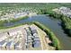 Community aerial view showing homes near a lake, highlighting the serene neighborhood environment at 201 Annabelle Blue Drive, Wake Forest, NC 27587