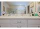 Modern bathroom with dual sinks, vanity, and a large mirror for a bright and spacious feel at 201 Annabelle Blue Drive, Wake Forest, NC 27587