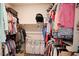 Walk-in closet with custom shelving, ample storage, and organized clothing racks at 201 Annabelle Blue Drive, Wake Forest, NC 27587