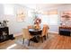 Elegant dining room featuring a stylish table, chairs, and decorative artwork at 201 Annabelle Blue Drive, Wake Forest, NC 27587