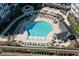 Aerial view of community pool featuring ample lounge chairs and seating areas at 201 Annabelle Blue Drive, Wake Forest, NC 27587