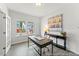 Well-lit office space featuring a large window, modern desk and stylish décor at 207 Curling Creek Dr # 300P, Clayton, NC 27527