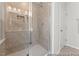 Modern shower room featuring a glass door and tile walls at 207 Curling Creek Dr # 300P, Clayton, NC 27527