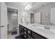 Bathroom with double sinks, great countertop space and a shower/tub combo at 212 Crisp Rd, Durham, NC 27713