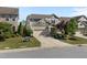 Attractive two-story home with a well-manicured lawn, an attached garage, and beautiful landscaping at 212 Crisp Rd, Durham, NC 27713