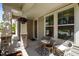 Inviting covered front porch with seating area, perfect for relaxing and enjoying the outdoors at 212 Crisp Rd, Durham, NC 27713