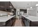 Well-appointed kitchen featuring a large island, modern appliances, and ample counter space for cooking at 212 Crisp Rd, Durham, NC 27713