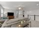 Spacious living room with comfortable seating, a ceiling fan, and lots of natural light at 212 Crisp Rd, Durham, NC 27713