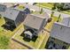 Aerial view of the backyard, featuring a fenced yard and a covered patio at 214 Dogwood Blossoms Dr, Durham, NC 27703