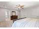 Spacious primary bedroom with ensuite bathroom and walk-in closet. Large sunny windows at 214 Dogwood Blossoms Dr, Durham, NC 27703
