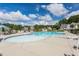 Community swimming pool with blue water and surrounding lounge seating at 214 Dogwood Blossoms Dr, Durham, NC 27703