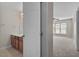 Hallway with view to bedroom, bathroom, and door at 235 Michigan Ave, Cary, NC 27519