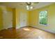 Bedroom with hardwood floors, a ceiling fan and a double door closet at 2457 Millbrook Dr, Haw River, NC 27258
