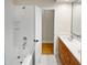 Bathroom with double sinks, shower, tub, and access to the next room at 280 Dreamcatcher Trl, Youngsville, NC 27596