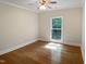 Bedroom with hardwood floors, ceiling fan, crown molding, and natural light at 280 Dreamcatcher Trl, Youngsville, NC 27596