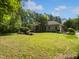 Spacious lawn and charming brick home with manicured landscaping at 280 Dreamcatcher Trl, Youngsville, NC 27596