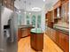 Beautiful kitchen with stainless appliances, island, hardwood floors, and plenty of natural light at 280 Dreamcatcher Trl, Youngsville, NC 27596