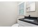Updated bathroom featuring modern sink, vanity, fixtures and natural light at 2917 Trail Six, Burlington, NC 27215