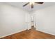 Bedroom with hardwood floors, a ceiling fan and a view of the bathroom at 2917 Trail Six, Burlington, NC 27215