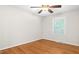 Bedroom with hardwood floors, ceiling fan and a window with natural light at 2917 Trail Six, Burlington, NC 27215