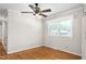 Dining room with a ceiling fan, hardwood floors, and a large window with natural light at 2917 Trail Six, Burlington, NC 27215