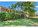 A nicely landscaped front yard complements this inviting brick home, complete with mature shrubs and a healthy lawn at 2917 Trail Six, Burlington, NC 27215