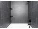 Modern walk-in shower with gray tile and contemporary fixtures at 2917 Trail Six, Burlington, NC 27215