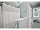 Bathroom with a shower and view into the bedroom at 300 Hutchins Dr, Garner, NC 27529