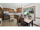 Charming eat-in kitchen with warm wood cabinetry and a view of the backyard at 300 Hutchins Dr, Garner, NC 27529