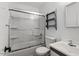 Bright bathroom with a glass-enclosed shower, modern fixtures, and white vanity at 300 Wakewood Ct, Raleigh, NC 27615