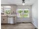Charming eat-in kitchen features modern appliances and ample light at 300 Wakewood Ct, Raleigh, NC 27615