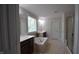 Bright bathroom featuring a soaking tub, separate vanities, and glass shower at 3032 Curling Creek Dr, Apex, NC 27502