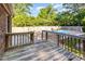 Outdoor deck area leading to a fenced in pool, great for entertaining and relaxing at 3209 Marie Dr, Raleigh, NC 27604