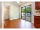 Eat-in kitchen featuring a glass sliding door to the outdoor pool and deck area at 3209 Marie Dr, Raleigh, NC 27604