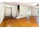 Spacious living room with hardwood flooring, staircase and bright natural light at 3209 Marie Dr, Raleigh, NC 27604