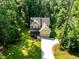 Traditional two-story home with a two car garage and a well-manicured lawn and landscaping at 3425 Donnigale Ave, Durham, NC 27705