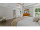Spacious main bedroom showing an ensuite bathroom and wood-style flooring at 3425 Donnigale Ave, Durham, NC 27705