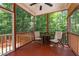 Relaxing screened-in porch with comfortable seating and wooded view at 3425 Donnigale Ave, Durham, NC 27705
